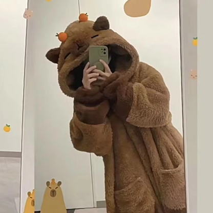 Kawaii women's capybara hooded sleepwear set. Plush, soft pajamas perfect for comfortable lounging.