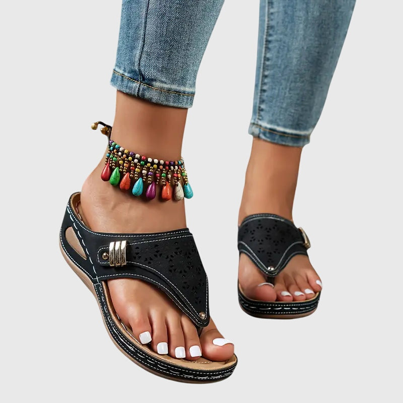 Woman wearing Kaylie orthopedic wedge sandals, enjoying ergonomic comfort and foot pain relief during summer.