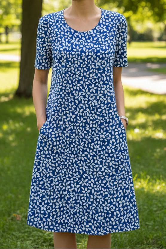 Women's casual knee-length floral summer dress with pockets for effortless everyday style.