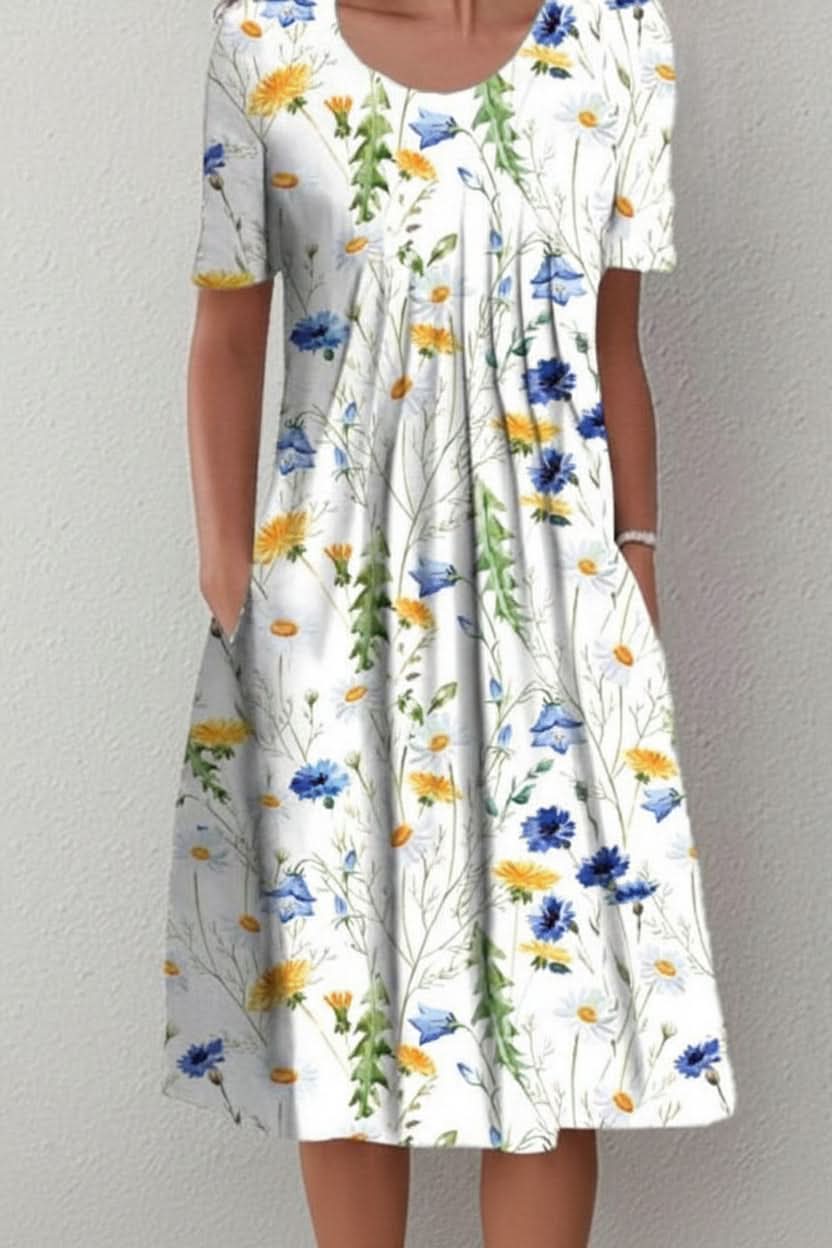 Everyday women's knee-length floral dress with functional pockets for casual summer wear.