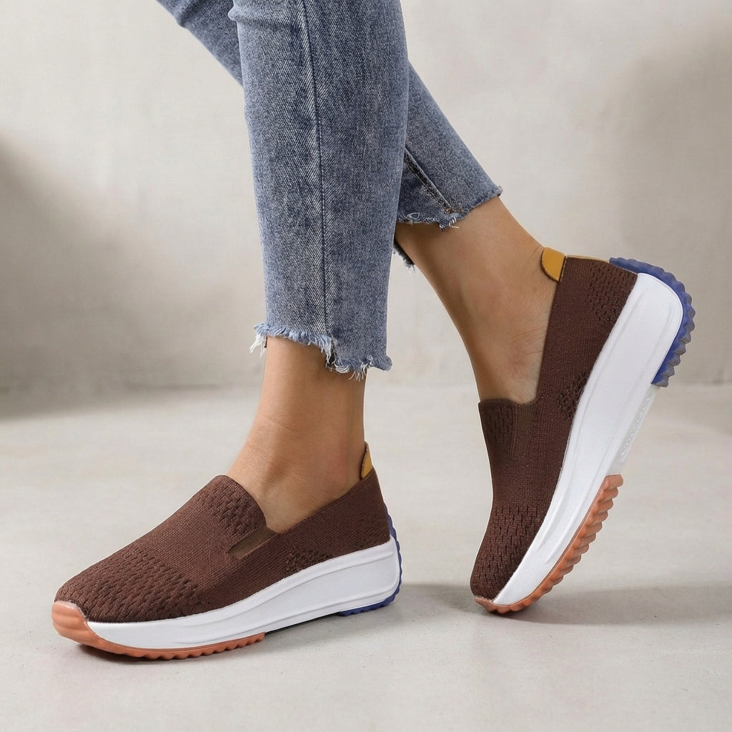 Stylish knit slip-on platform sneakers for women. Features orthopedic support and comfortable design for active wear.
