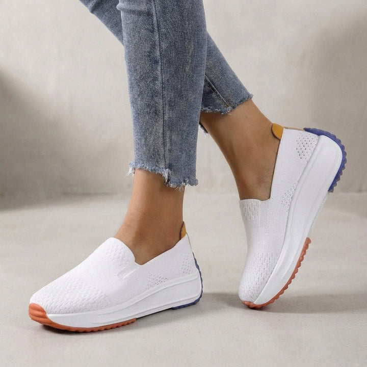Women's modern knit slip-on platform sneakers, offering orthopedic support & slip-on comfort for everyday fashion.