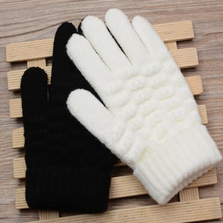 Soft knitted women's gloves, touchscreen enabled for winter outdoor wear & warmth.