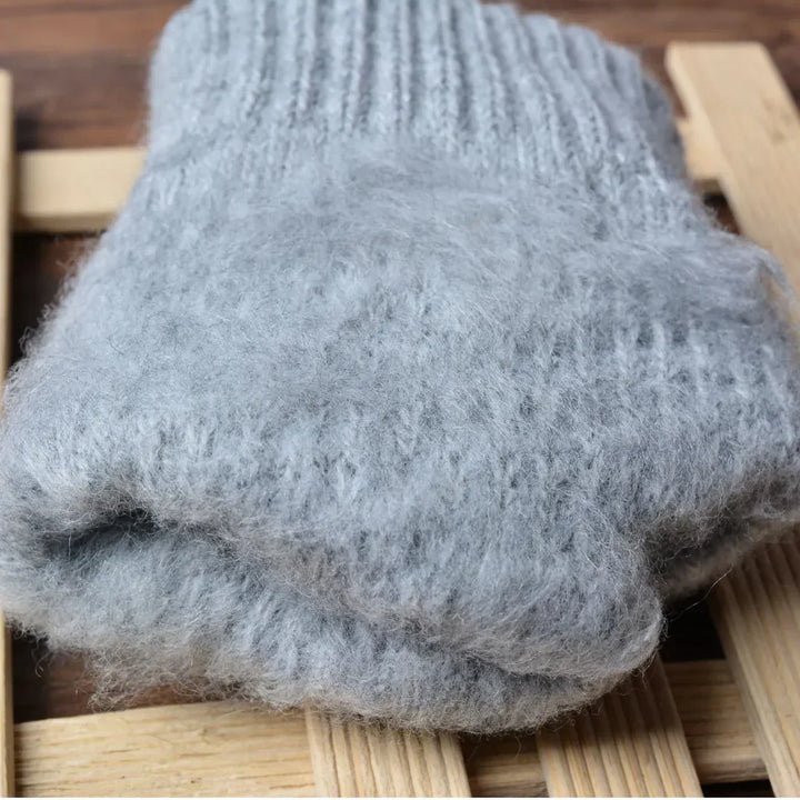Stay connected with warm women's knitted touchscreen winter gloves, a cozy choice.