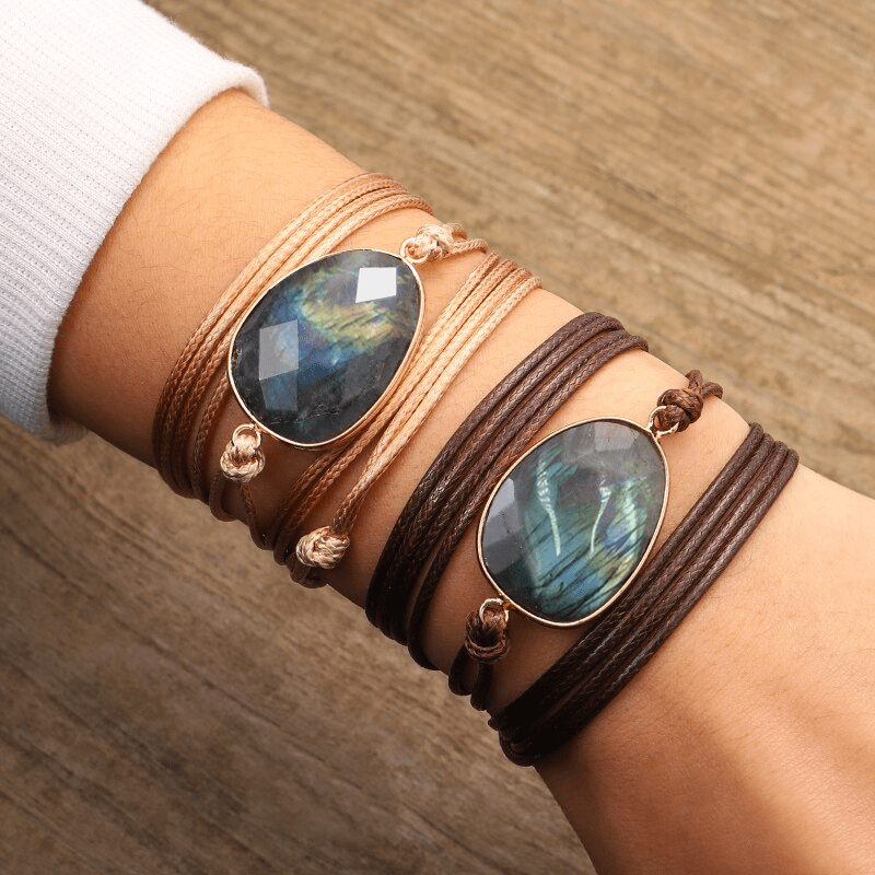 Women's Labradorite rope wrap bracelet with shimmering blue-green flash, perfect for bohemian & spiritual styles.