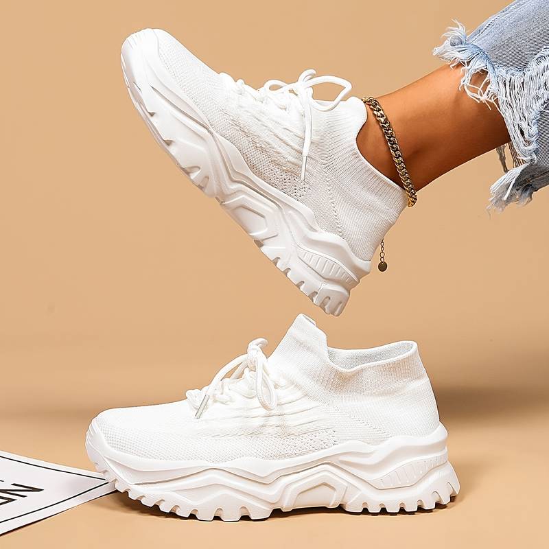 Modern women's chunky sole casual sneakers. Lace-up design for comfortable, breathable everyday fashion.
