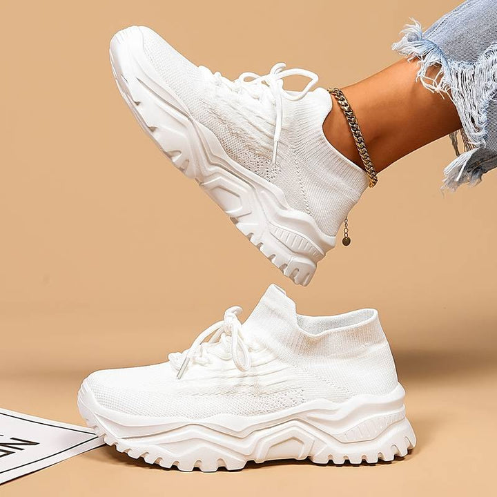 Modern women's chunky sole casual sneakers. Lace-up design for comfortable, breathable everyday fashion.