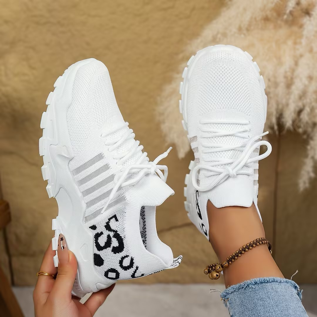 Women's lace-up orthopedic comfort sneakers, ideal for walking and everyday support.