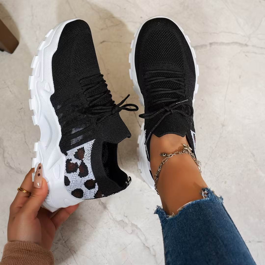 Supportive women's lace-up orthopedic sneakers with cushioning for stable, all-day walking comfort.