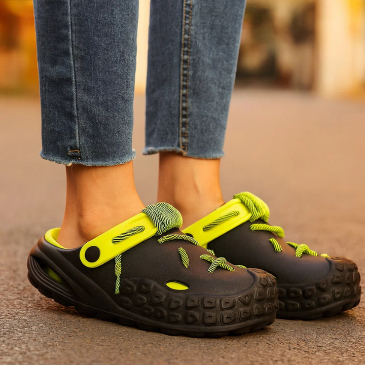 Fashionable & comfortable women's laced clogs, customizable style, breathable, water-friendly.