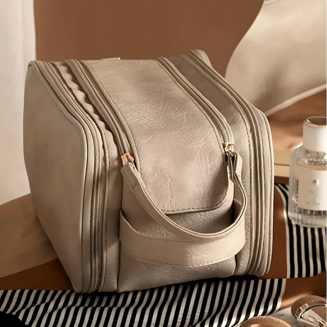 Women's large capacity waterproof makeup organizer bag by LuxeVault for beauty storage & travel.