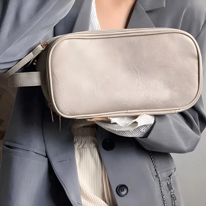 Open LuxeVault makeup bag showing organized cosmetics; large capacity & waterproof design.