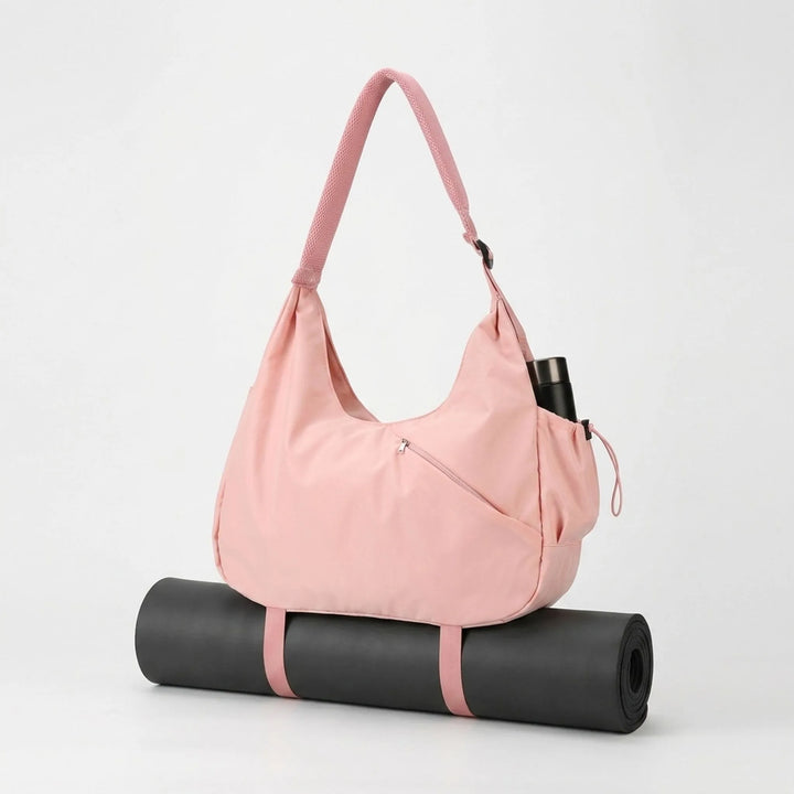 Stylish women's large gym tote bag, perfect for fitness, yoga & activewear. Durable sports accessory & travel workout bag.