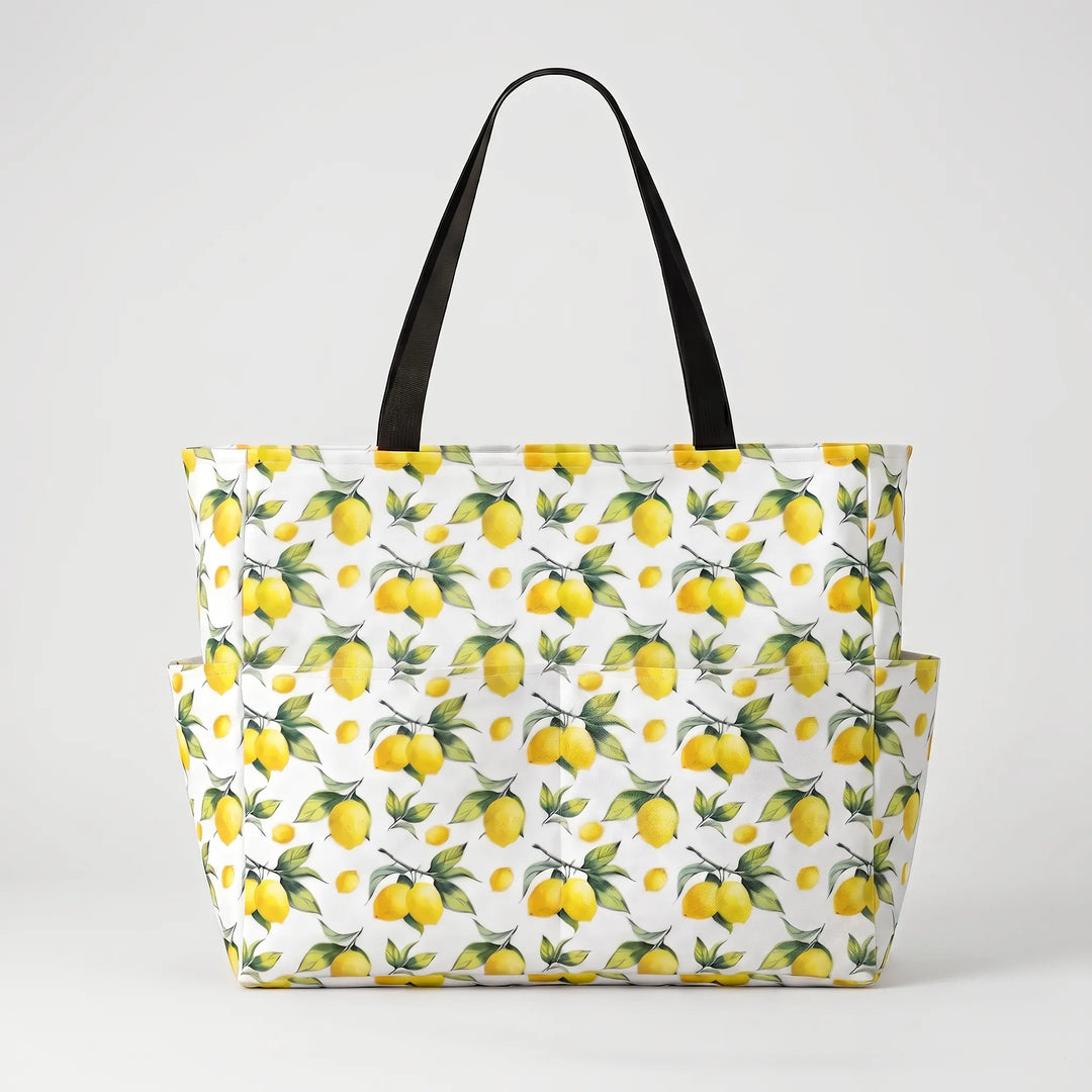 Spacious women's beach tote bag, perfect for carrying towels & summer essentials on vacation. Tropical print.