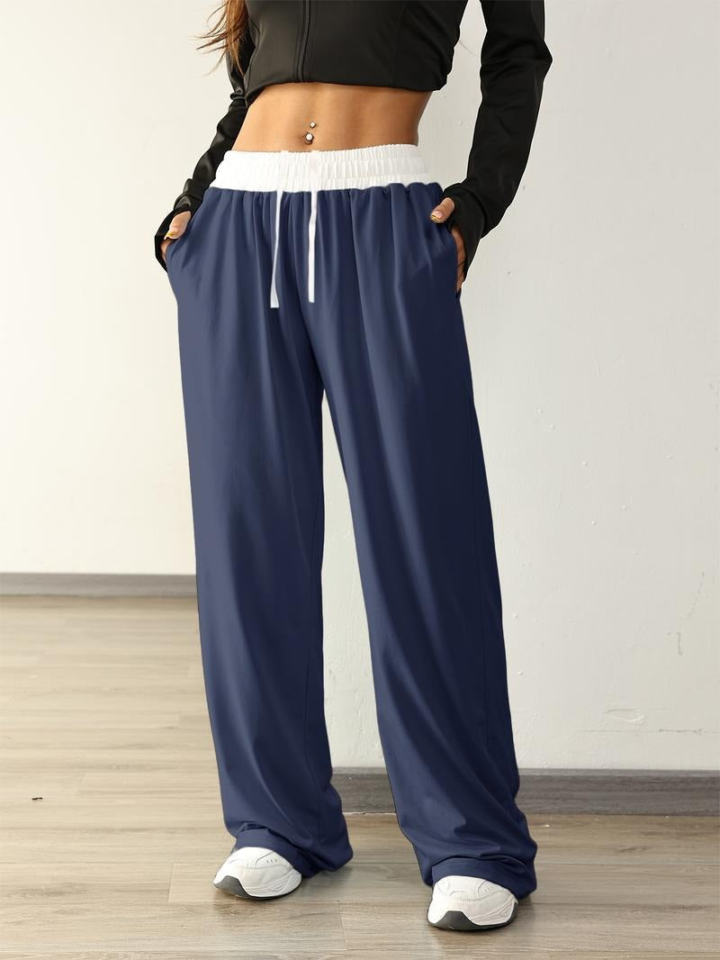 Woman wearing comfortable relaxed wide-leg sweatpants, ideal for lounging, casual outings, or athleisure style.