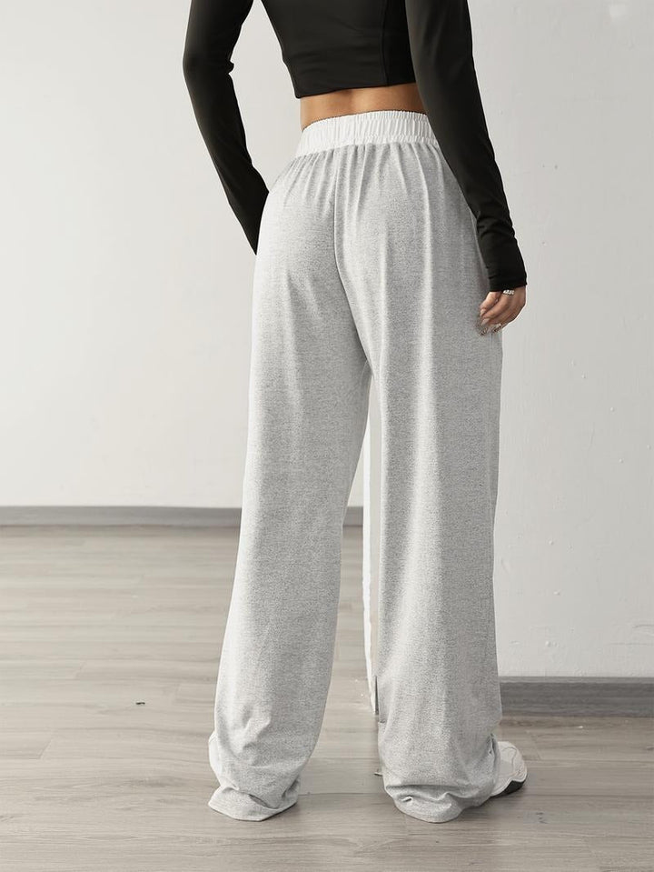 Lazio women's relaxed wide-leg sweatpants, offering a comfortable, flowy fit & stylish look for everyday wear.