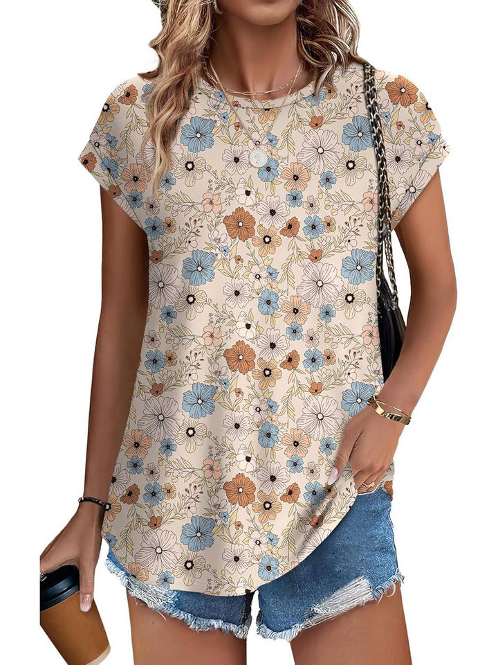 Vibrant watercolor leaf print women's top, a relaxed fit blouse for casual spring fashion.