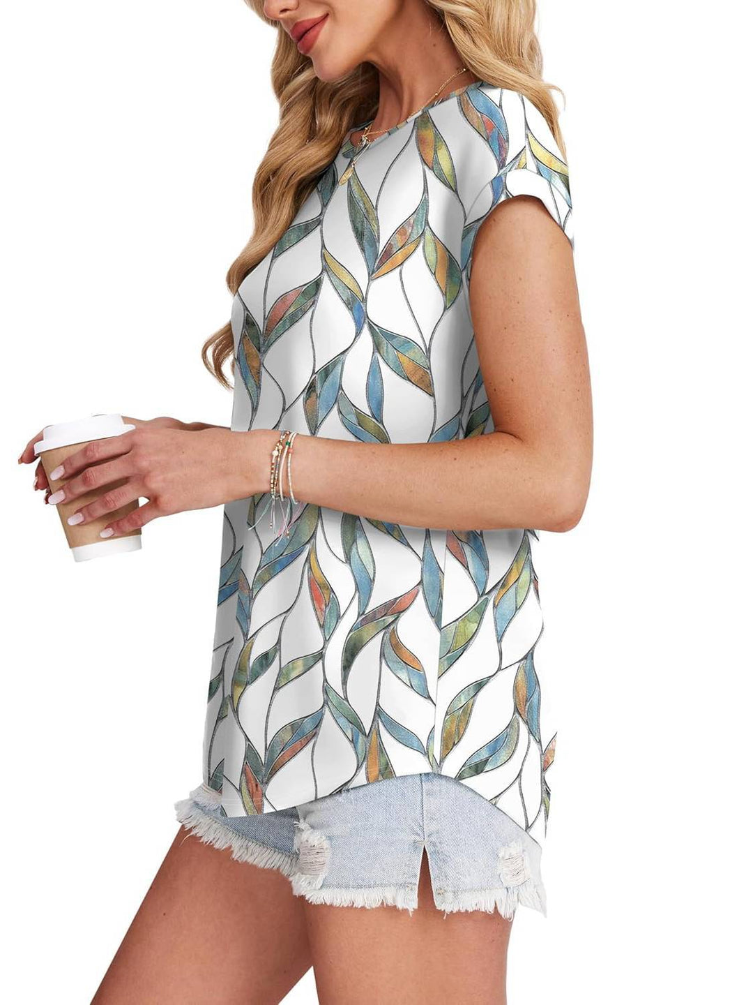 Spring fashion women's blouse, watercolor leaf print and crew neck for ultimate comfort.