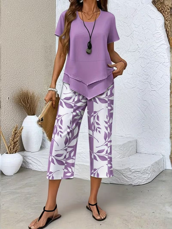 Bohemian women's leaf print top and cropped pants set, perfect for summer travel wear.