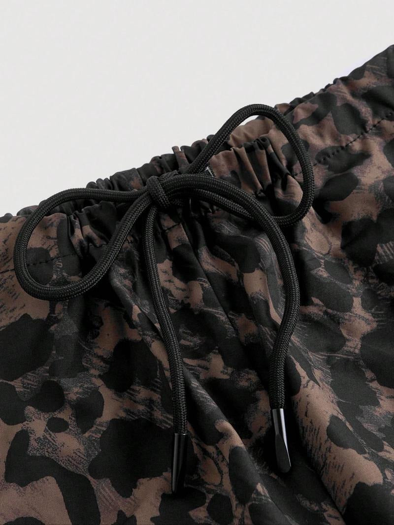 Versatile women's wide-leg leopard print cargo trousers, blending casual comfort with a stylish utility aesthetic.