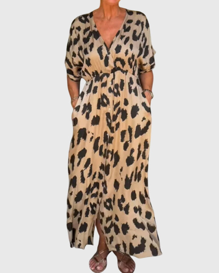 Women's leopard print V-neck maxi dress with button front, elastic waist for a comfortable, versatile summer look.