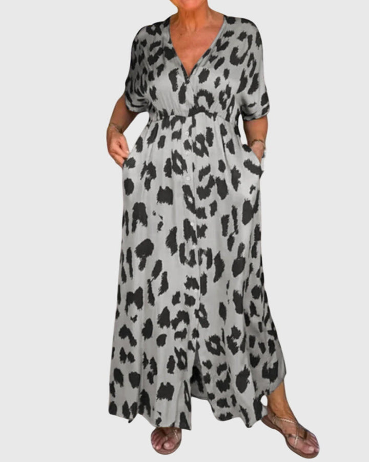 Flowy leopard print V-neck maxi dress with button front, perfect for casual summer wear or an evening out.