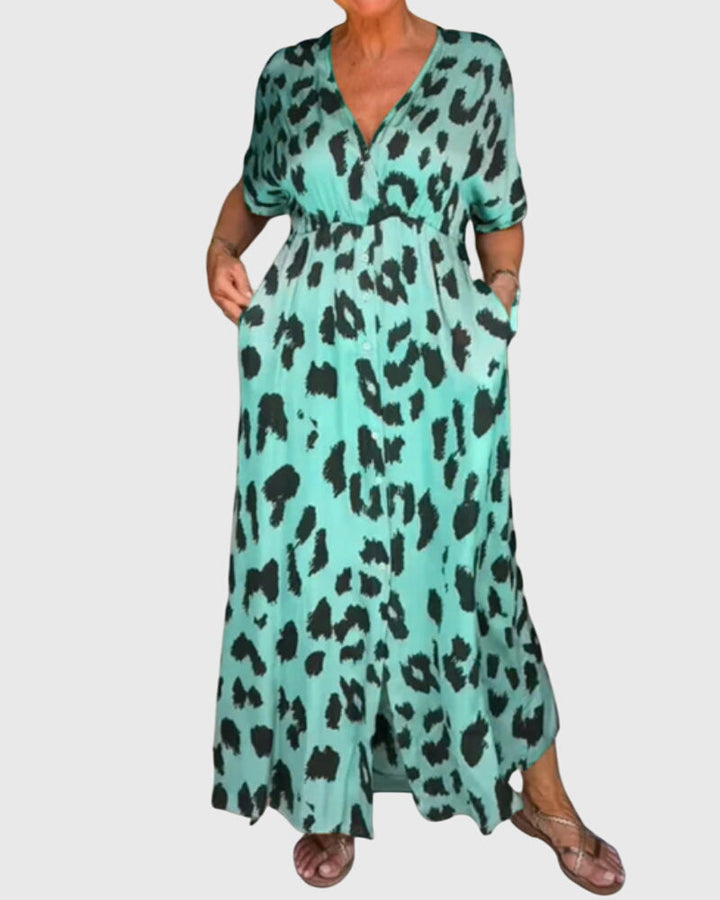 Comfortable women's leopard print V-neck maxi dress featuring a stylish button front and elastic waist.