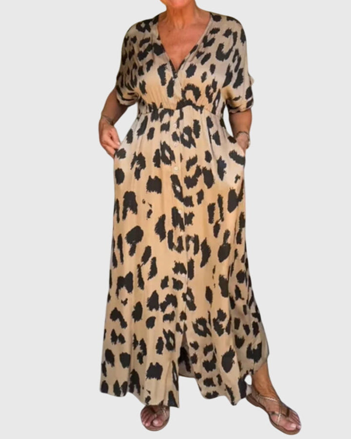 Stylish women's leopard print V-neck maxi dress with button front, an elastic waist, perfect for versatile fashion.