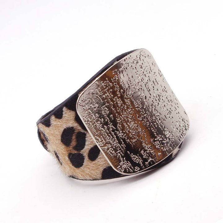 Handcrafted leopard print leather wrap bracelet for women, adjustable & chic fashion accessory.