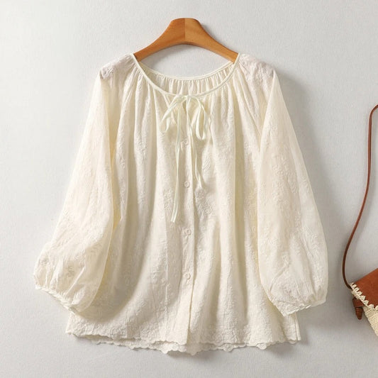 Women's Lia embroidered tie-neck blouse in soft, lightweight fabric, perfect for elegant casual spring & summer wear.