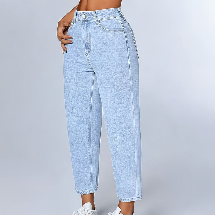 Light blue women's mom jeans, relaxed high waist fit. Tapered leg denim with a comfortable cuffed hem.