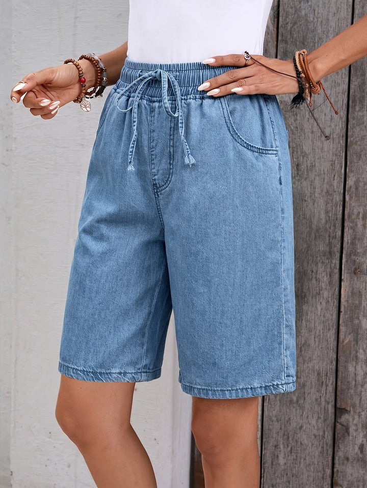 Comfortable women's light blue wide leg Bermuda shorts with an adjustable drawstring waist for a relaxed fit.