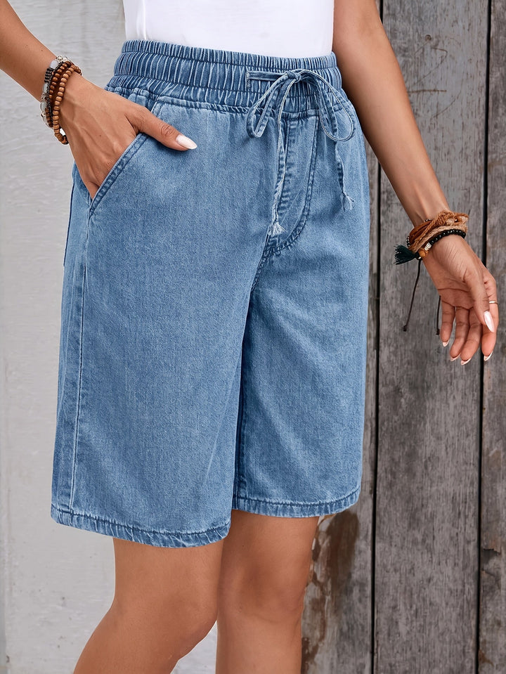 Stylish light blue women's Bermuda shorts, wide leg design, and a practical drawstring waist for everyday wear.