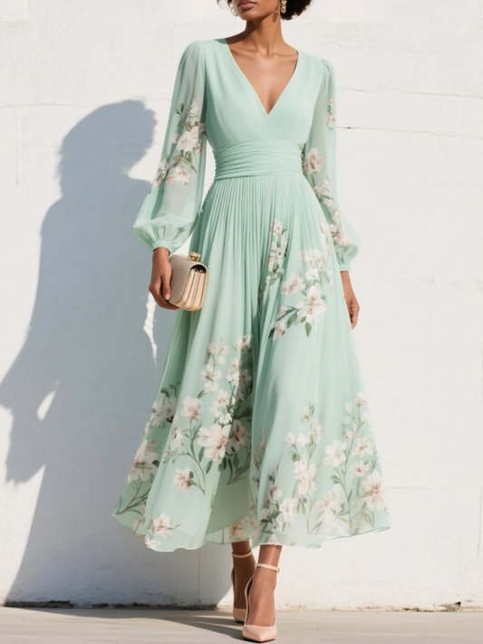 Women's light green V-neck pleated floral midi dress with balloon sleeves, perfect for elegant summer occasions.