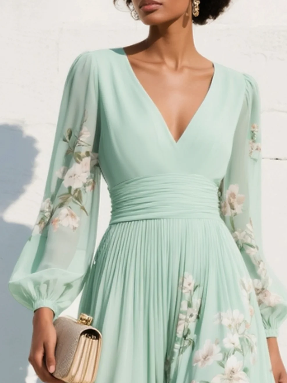 Chic light green A-line floral midi dress with a flattering V-neck, elegant pleats, and stylish balloon sleeves.