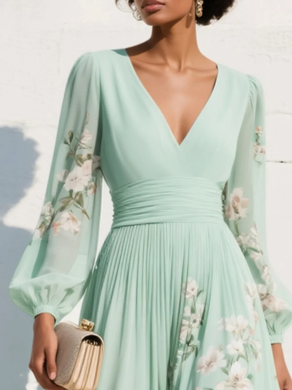 Chic light green A-line floral midi dress with a flattering V-neck, elegant pleats, and stylish balloon sleeves.