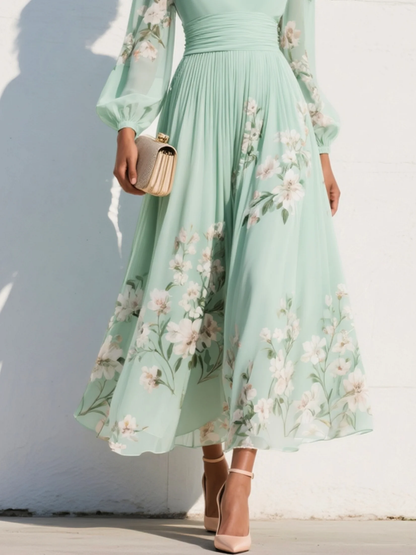 Women's summer light green V-neck midi dress, pleated floral pattern, flowy A-line for spring fashion & parties.
