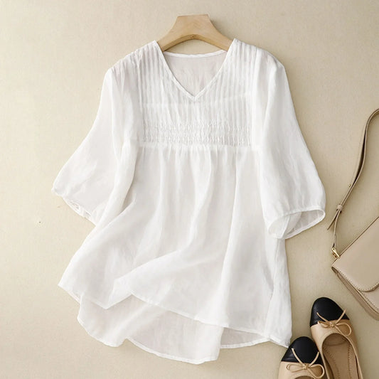 Women's lightweight breathable button-up shirt, perfect for casual summer wear & everyday style.