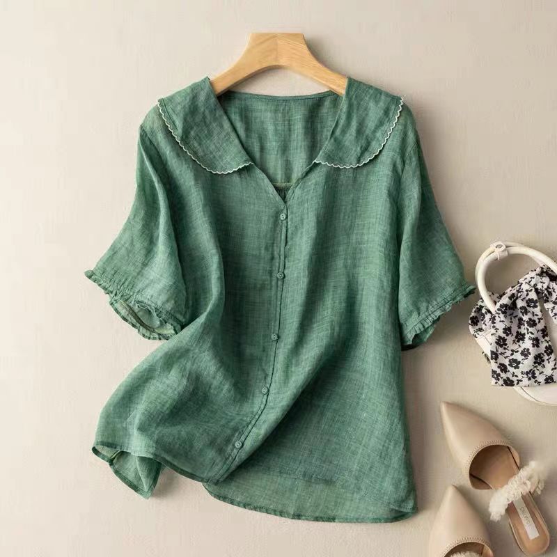 Women's lightweight breezy blouse with a delicate scalloped collar, perfect for spring and summer fashion.