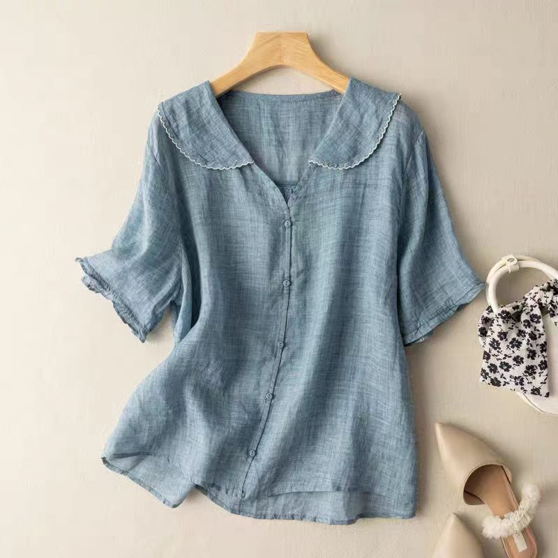 Casual women's lightweight blouse, soft and breezy, showcasing a chic scalloped collar. Ideal for warm weather.
