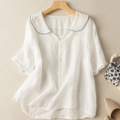 Soft, lightweight women's breezy blouse with an elegant scalloped collar. A comfortable and stylish spring top.