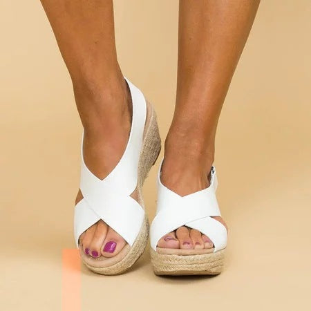 Comfortable women's open-toe flat sandals, ideal for everyday casual wear & summer walks. Lightweight and stylish.