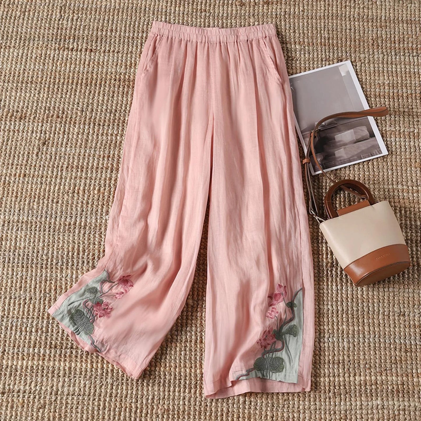 Women's lightweight floral cotton summer trousers, perfect for casual wear and warm weather.