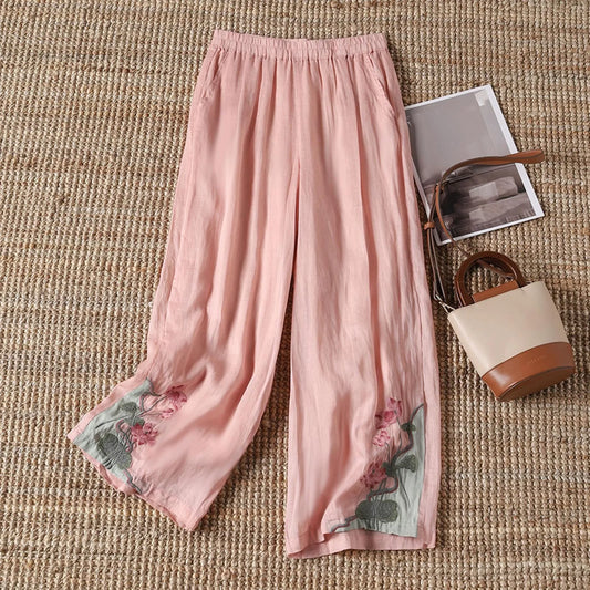 Women's lightweight floral cotton summer trousers, perfect for casual wear and warm weather.