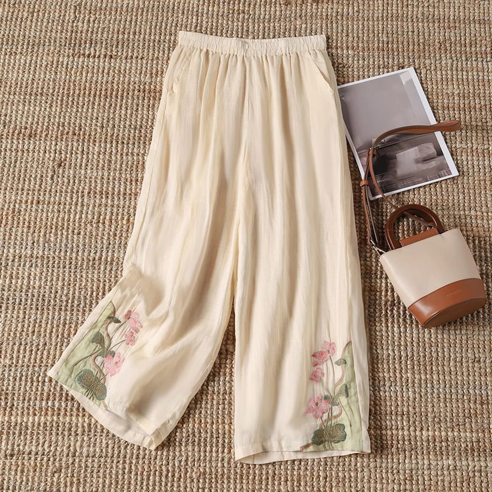 Comfortable women's breathable cotton floral print pants, ideal for beach days or vacation outfits.