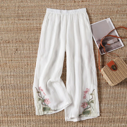 Stylish women's floral print cotton blend trousers, lightweight and perfect for summer's casual fashion.