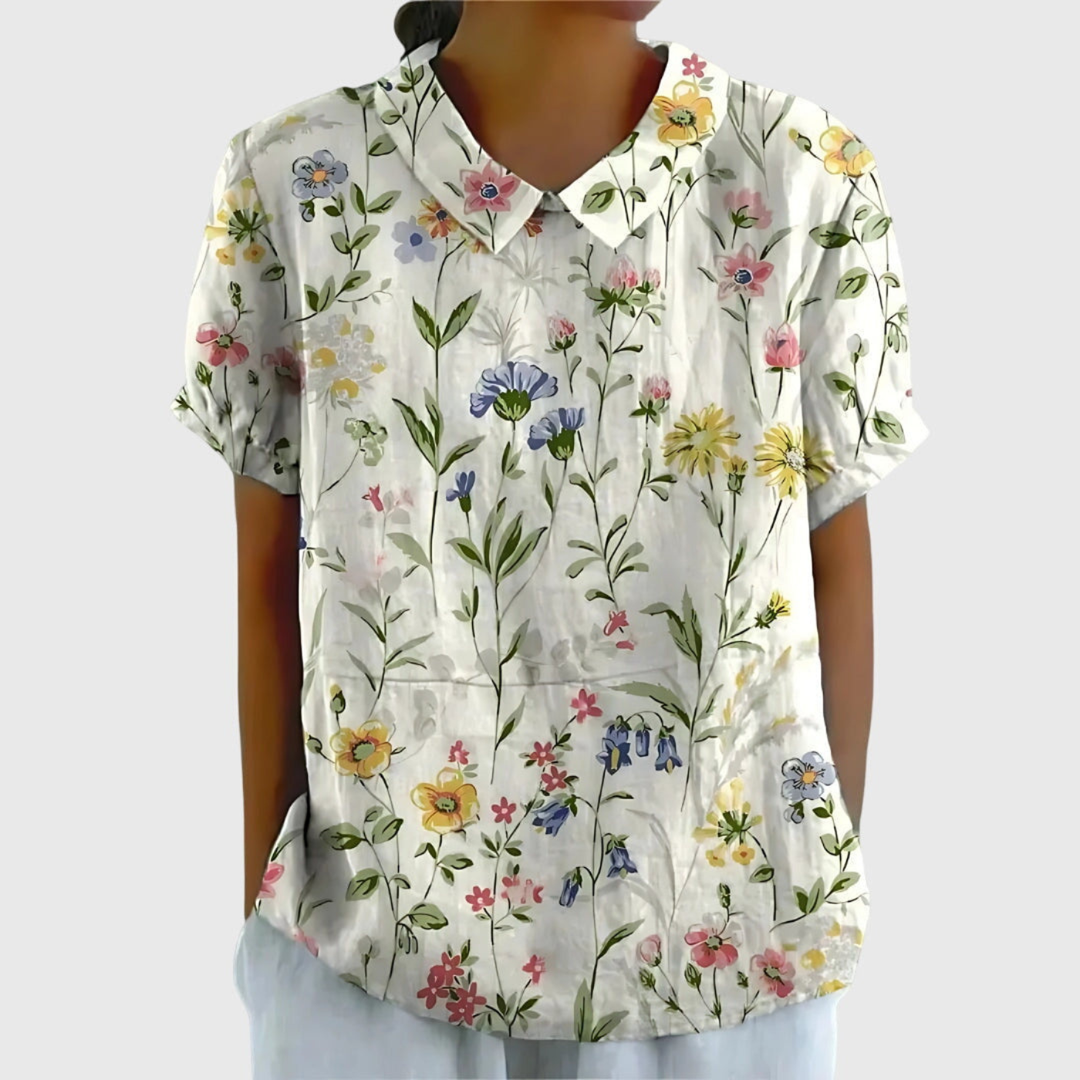 Women's lightweight floral print blouse with short sleeves, perfect for summer casual chic.
