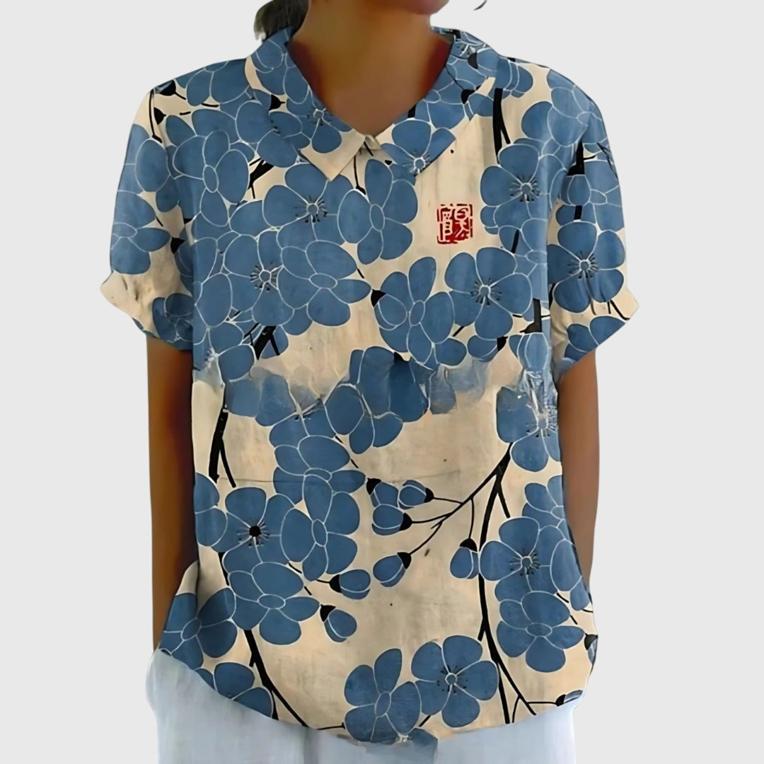 Elegant women's short sleeve floral blouse, a relaxed fit summer top for versatile styling.