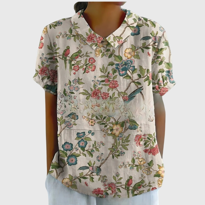 Elegant collared floral print blouse for women, a comfortable and stylish summer option.