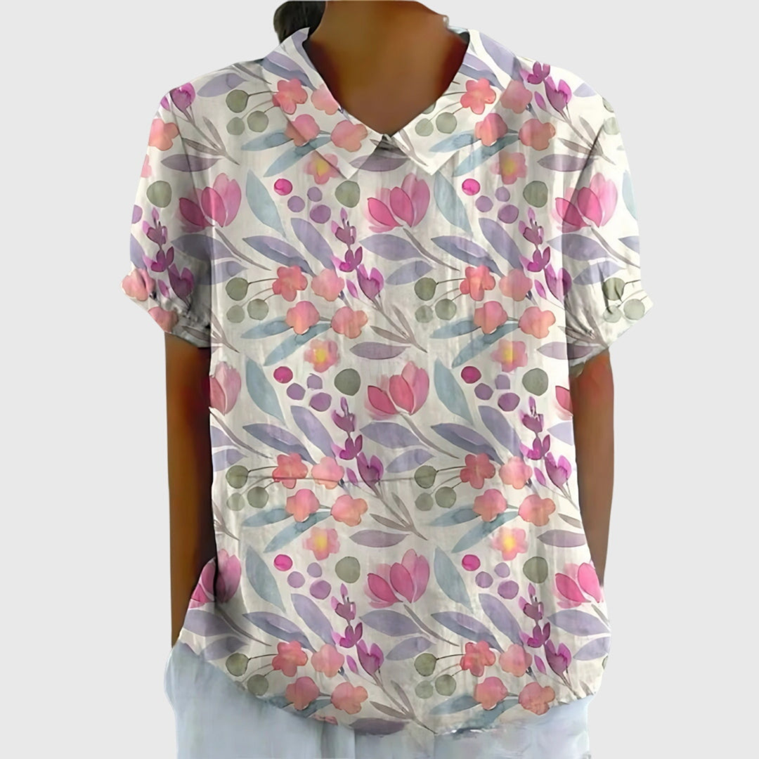 Women's summer blouse, a relaxed fit floral print top perfect for warm weather activities.